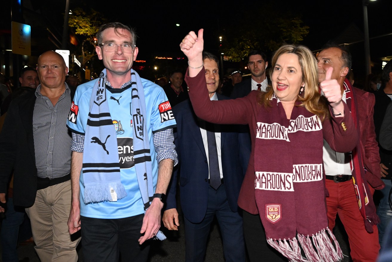 NSW Premier Dominic Perrottet (left) and  Queensland Premier Annastacia Palaszczuk (right) walk down Caxton Street before Game 3 of the 2022 State of Origin series. Brisbane is now in line to steal the NRL grand final from Sydney  (AAP Image/Darren England)