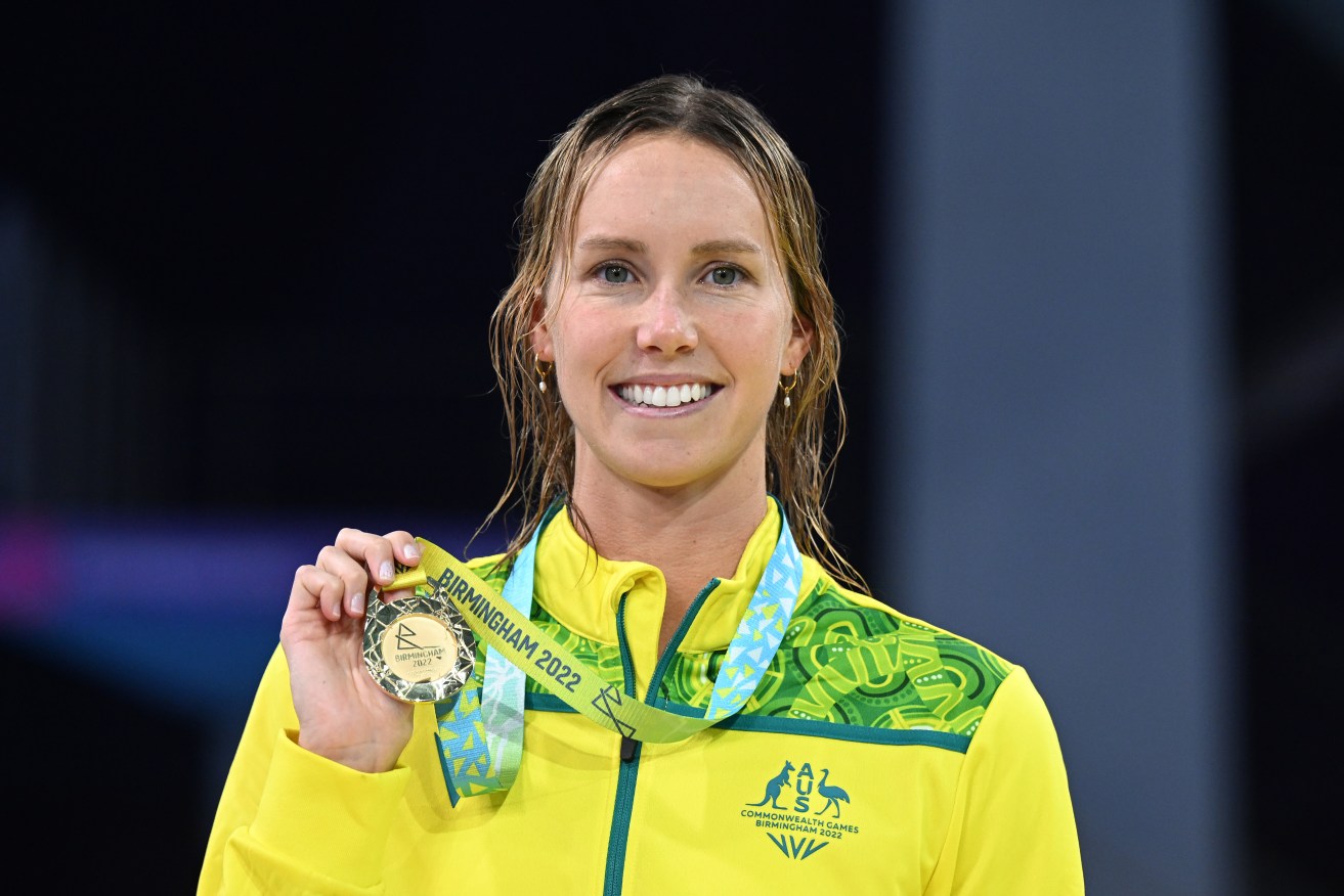 Australian swimmer Emma McKeon poses with her gold medal after winning the Women’s 50m Freestyle Swimming Final during Day 3 of the XXII Commonwealth Games at the Sandwell Aquatics Centre in Birmingham. (AAP Image/Dave Hunt) 
