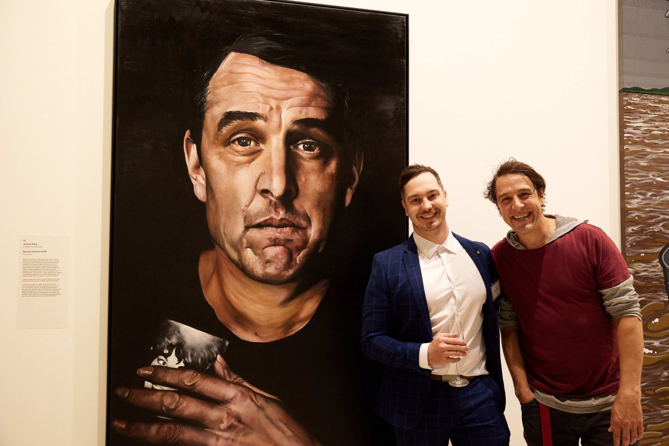 Artist Jeremy Eden and actor Samuel Johnson with Eden’s portrait of Johnson at the Art Gallery of NSW in Sydney.  (AAP Image/Supplied by the Art Gallery of NSW, Mim Stirling) 