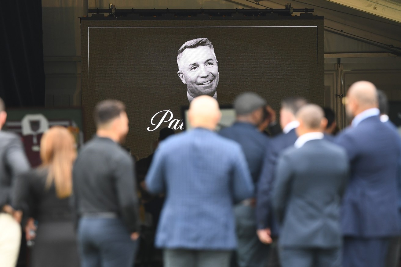 The public funeral service for former Queensland coach and NRL premiership player Paul Green at Kougari Oval in Brisbane. (AAP Image/Jono Searle) 