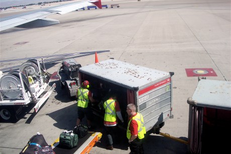 Baggage boss: Qantas taps executives to act as ground crew