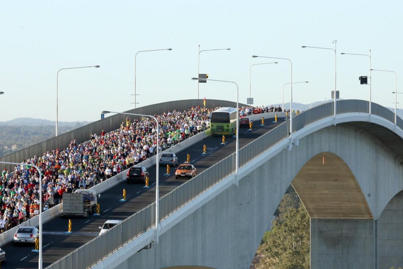 Runners cross the Gateway Bridge in the annual Bridge to Brisbane fun run. (Photo: The Courier Mail)