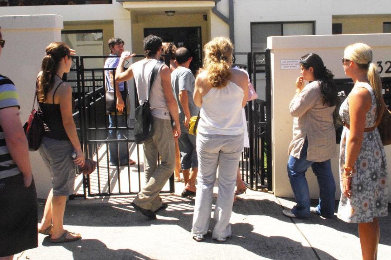 Desperate renters queue up outside a rental house. (Photo: RealEstate.com)