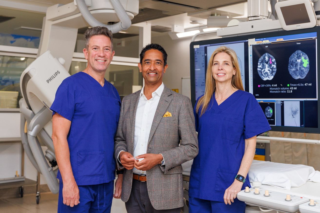 In the operating theatre, from left: Dr Hal Rice, Dr Atul Gupta from Philips, Dr Laetitia de Villiers). (Image: Supplied)