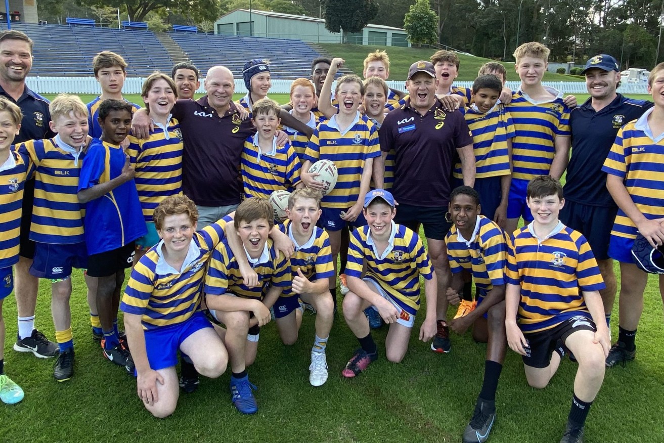 Broncos royalty Allan Langer and Kevin Walters with the Grade 7 rugby league team at Marist College, Ashgrove.