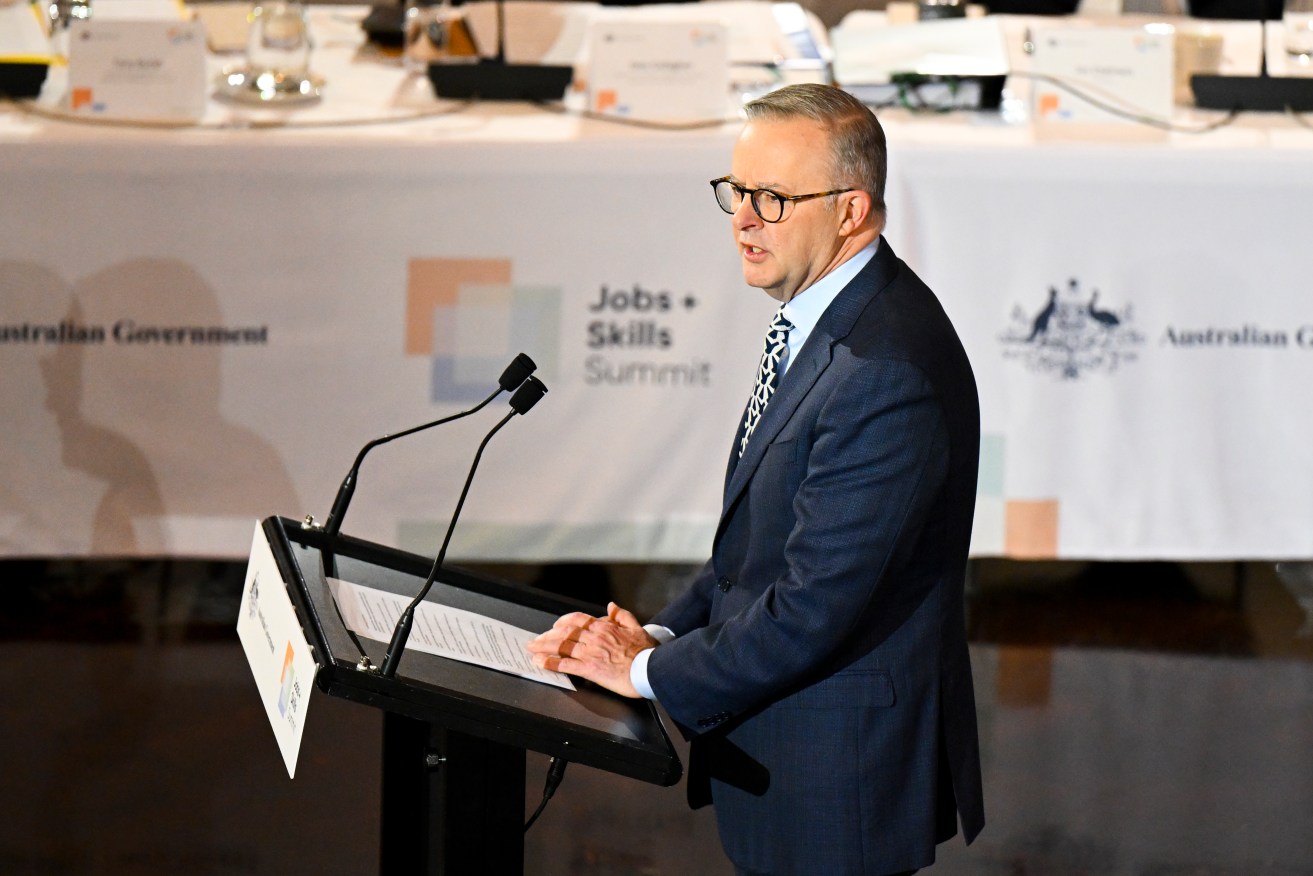 Australian Prime Minister Anthony Albanese addresses attendants at the Jobs and Skills Summit.(AAP Image/Lukas Coch) 
