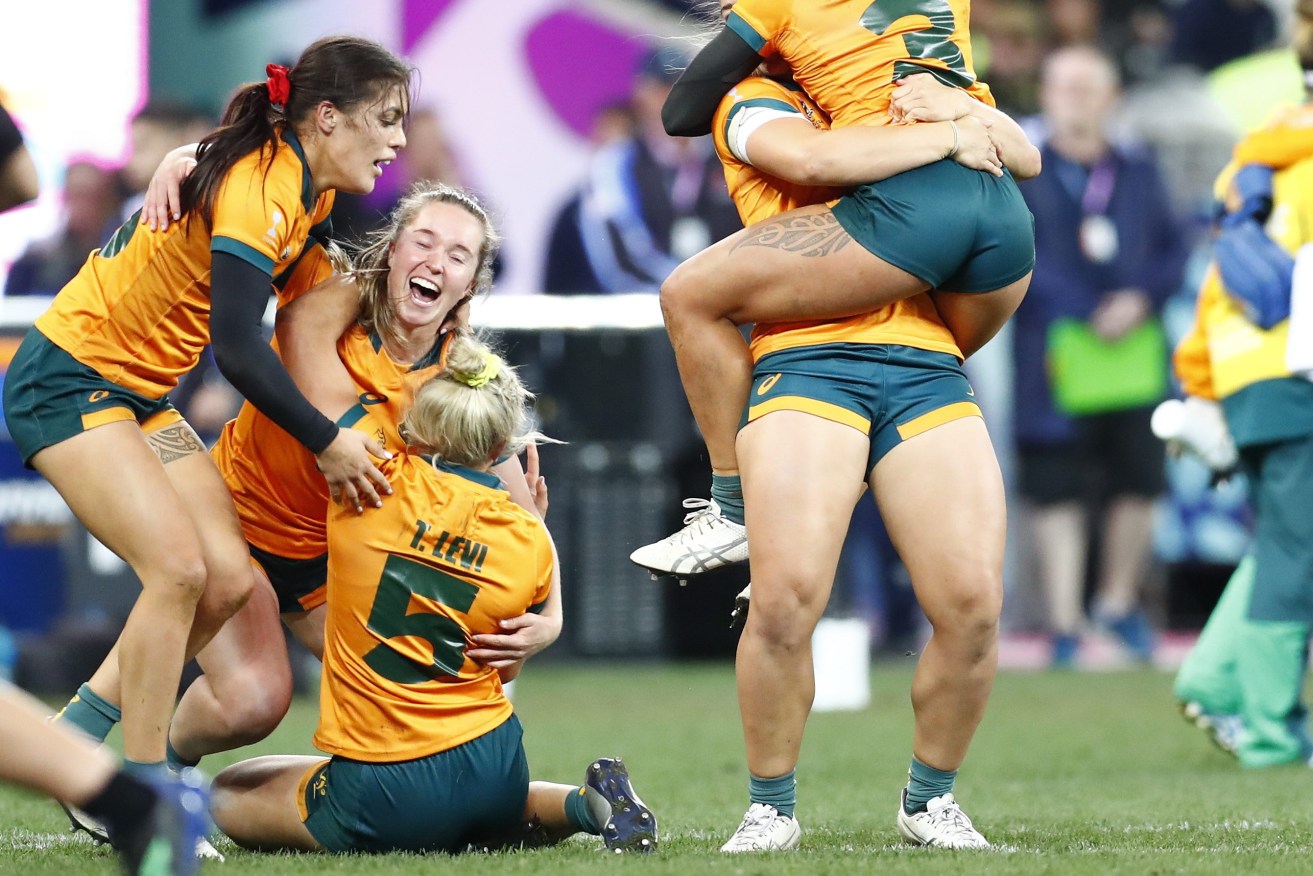 Team Australia react after winning the Rugby World Cup Sevens women's final match between New Zealand and Australia in Cape Town, South Africa, 11 September 2022.  EPA/NIC BOTHMA