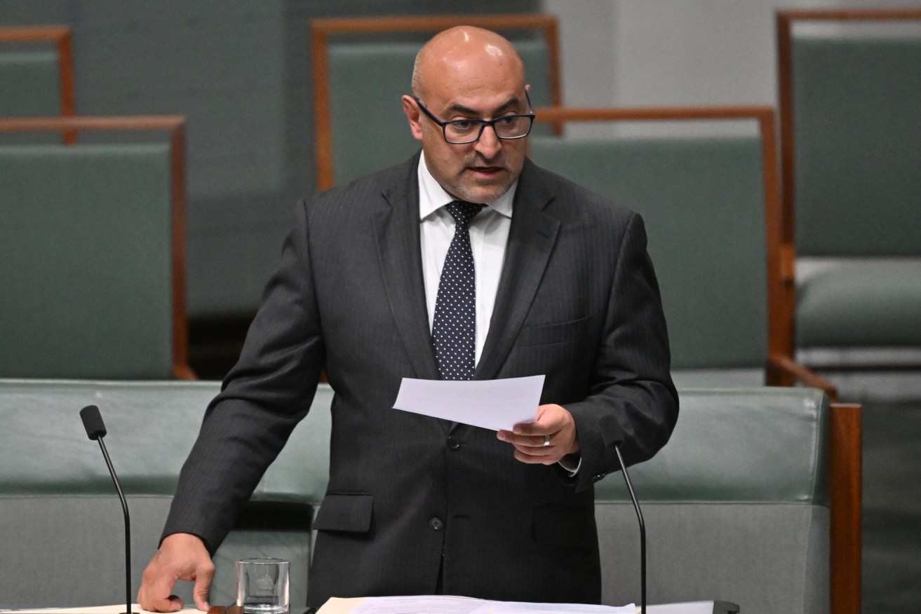 Chair of the Parliamentary Intelligence and Security Committee Peter Khalil makes a statement about the Optus security breach in Canberra, Monday, September 26, 2022. (AAP Image/Mick Tsikas) 