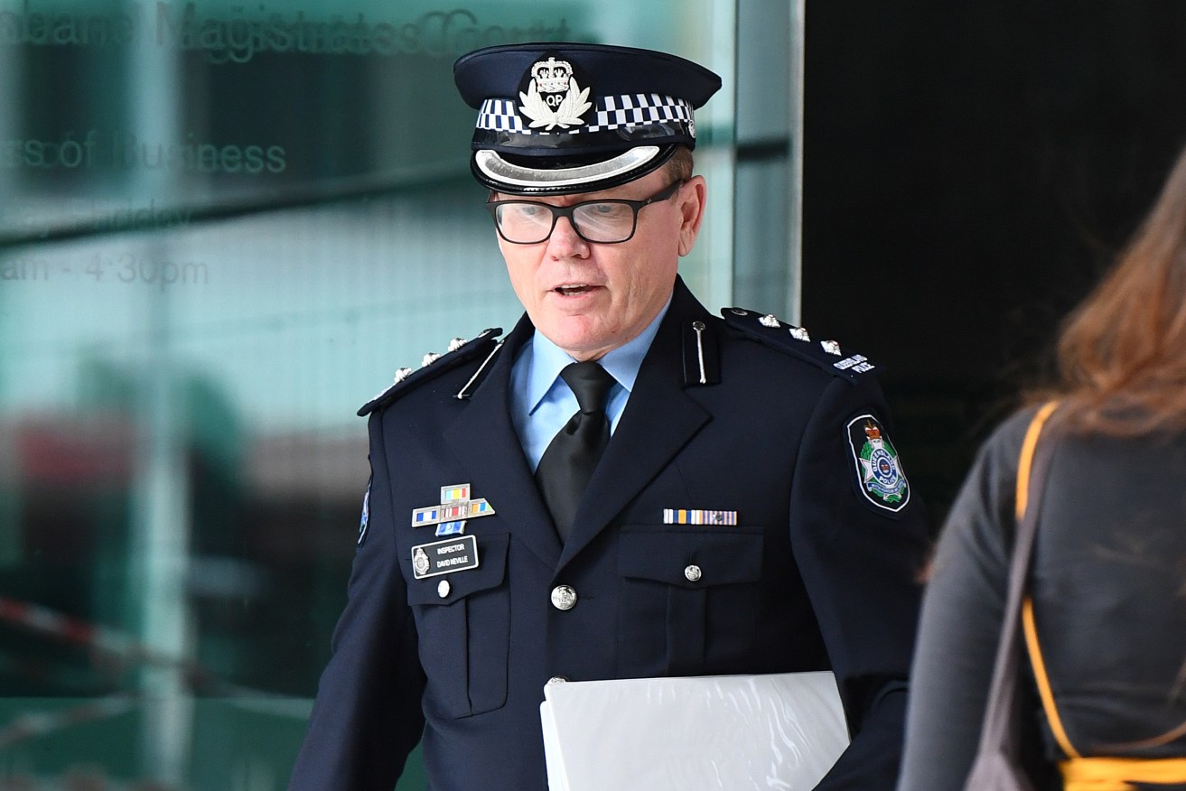 Inspector David Neville leaves the Commission of Inquiry into Forensic DNA Testing in Queensland. (AAP Image/Jono Searle)