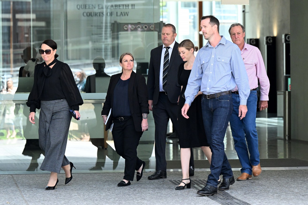 The family and friends of manslaughter victim Rex Kable Keen leaving the Brisbane Supreme Court. (AAP Image/Darren England) 