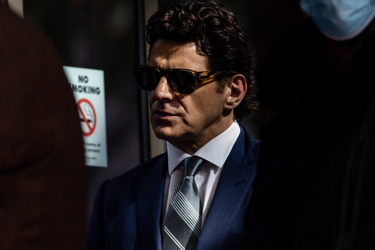 Vince Colosimo arrives at the Melbourne Magistrates Court. He was allegedly caught driving under the influence of drugs and driving whilst disqualified. (AAP Image/Diego Fedele) 