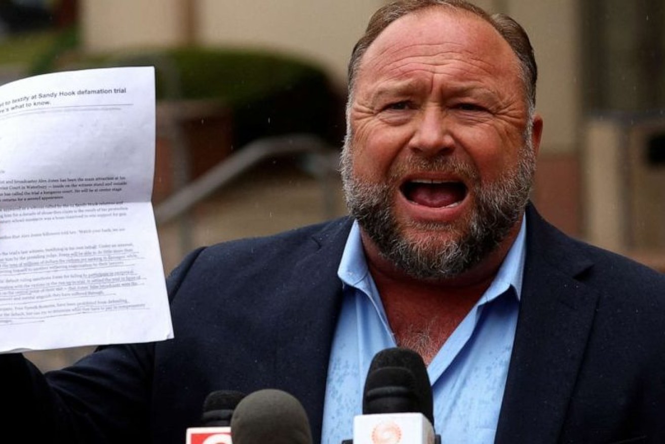 Shock jock Alex Jones has been forced to pay $1 billion to families of Sandy Hook victims. (ABC image)