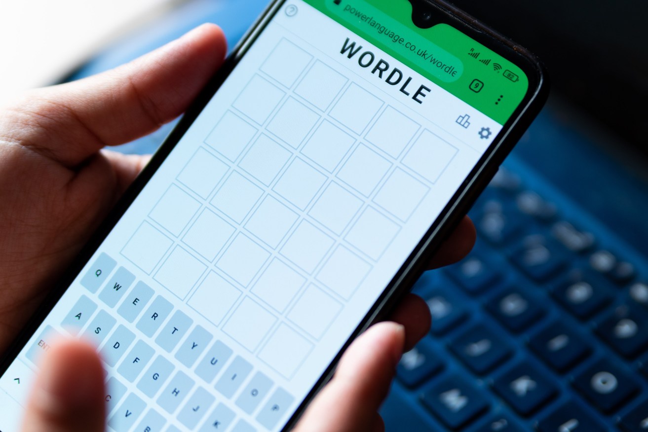In this photo illustration the online word game Wordle is seen on the screen of a mobile phone. (Photo by Davide Bonaldo / SOPA Images/Sipa USA)