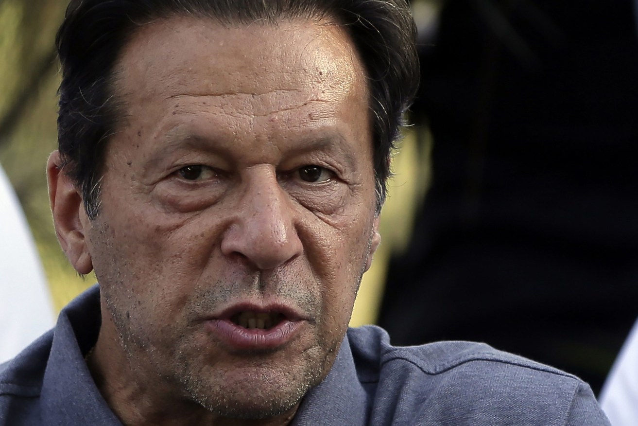 Pakistani officials said  a gunman opened fire at a container truck carrying Imran Khan, wounding him slightly and also some of his supporters. (PAP Photo/Rahmat Gul, File)