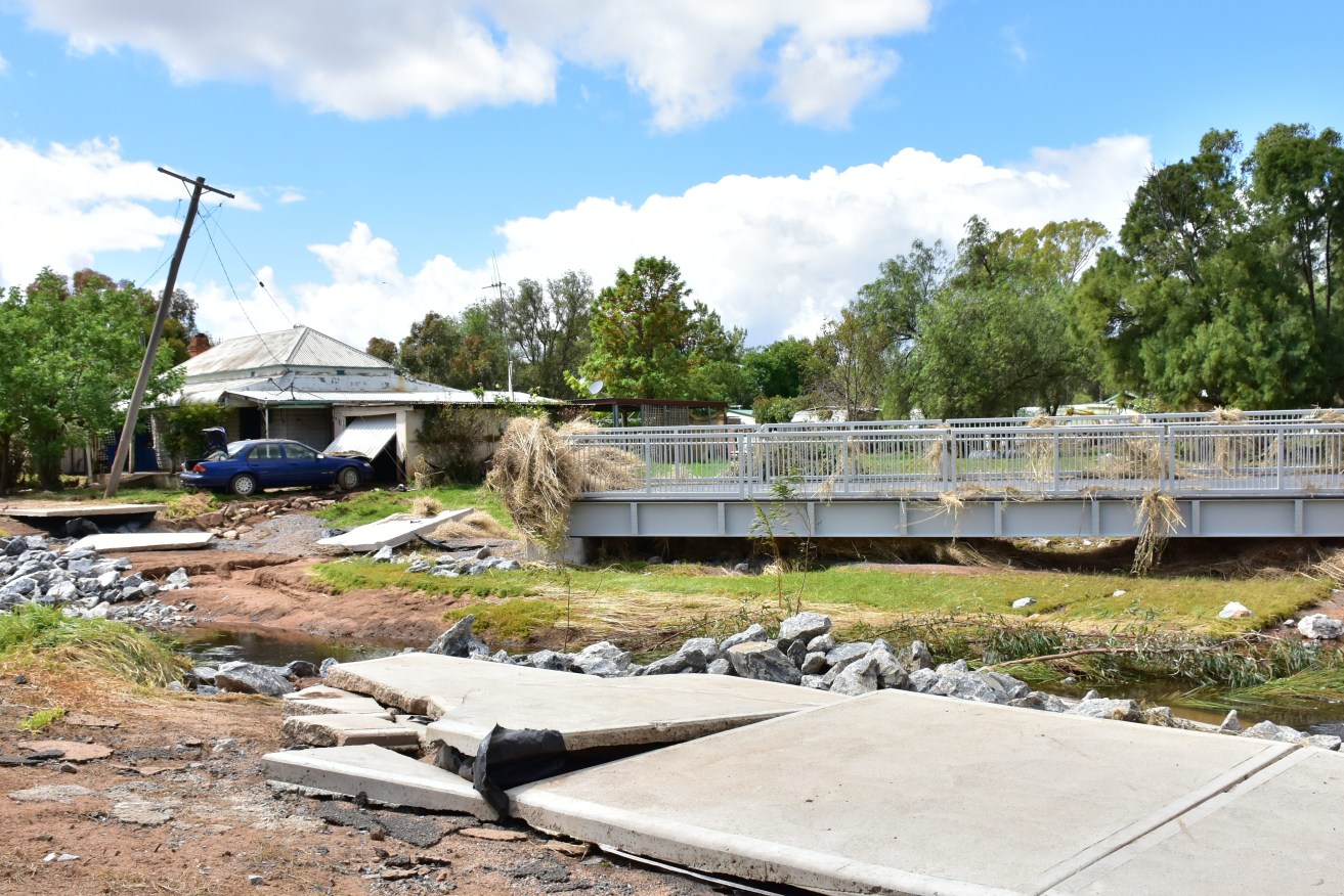 Flood damage is seen in Eugowra, Central West New South Wales.  Authorities are warning it could be months before flooding impacts are resolved in NSW as a second death is recorded in Eugowra. (AAP Image/Lucy Cambourn) 