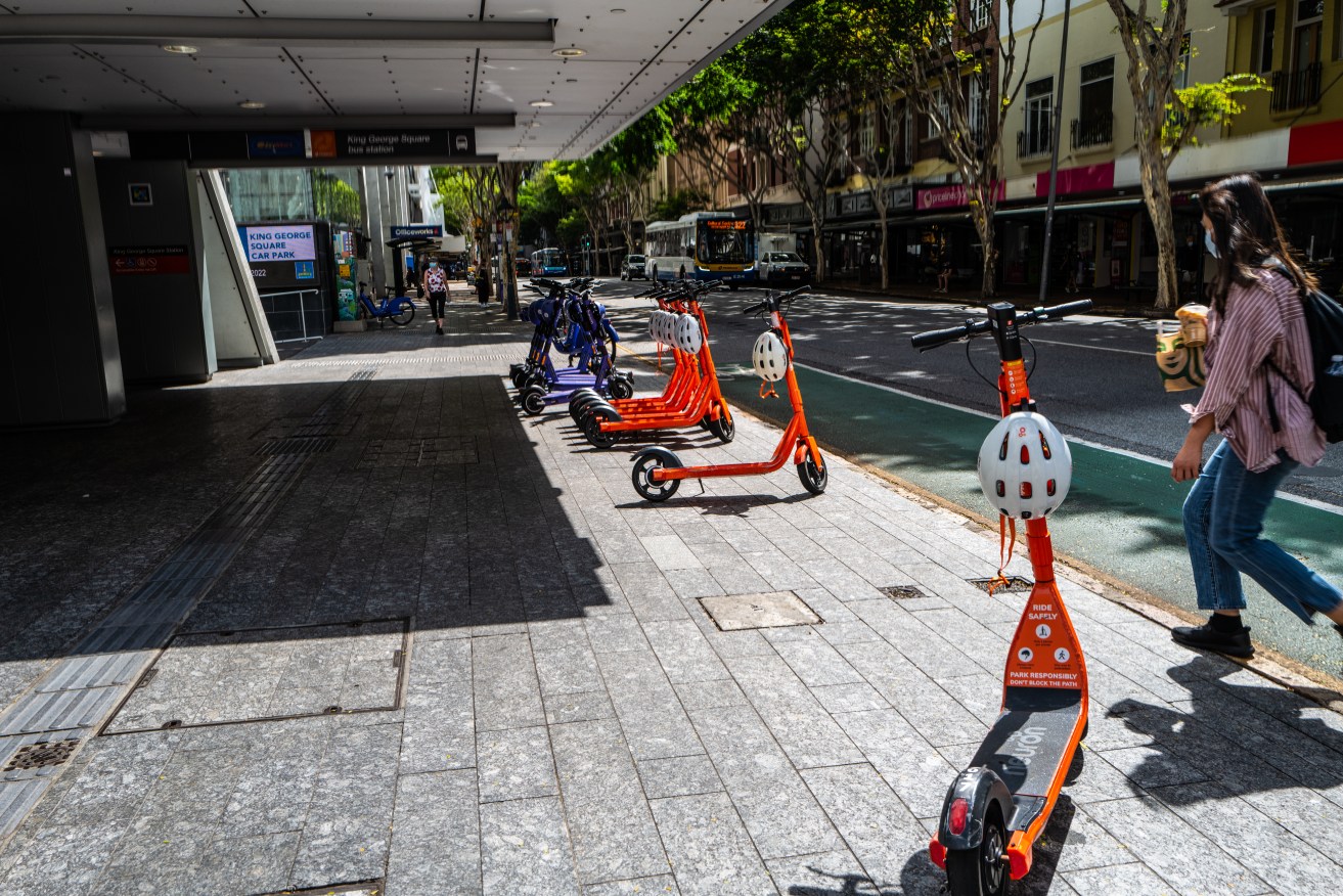 E-scooters parked outside King George Square bus station. (Image: John Robert McPherson)