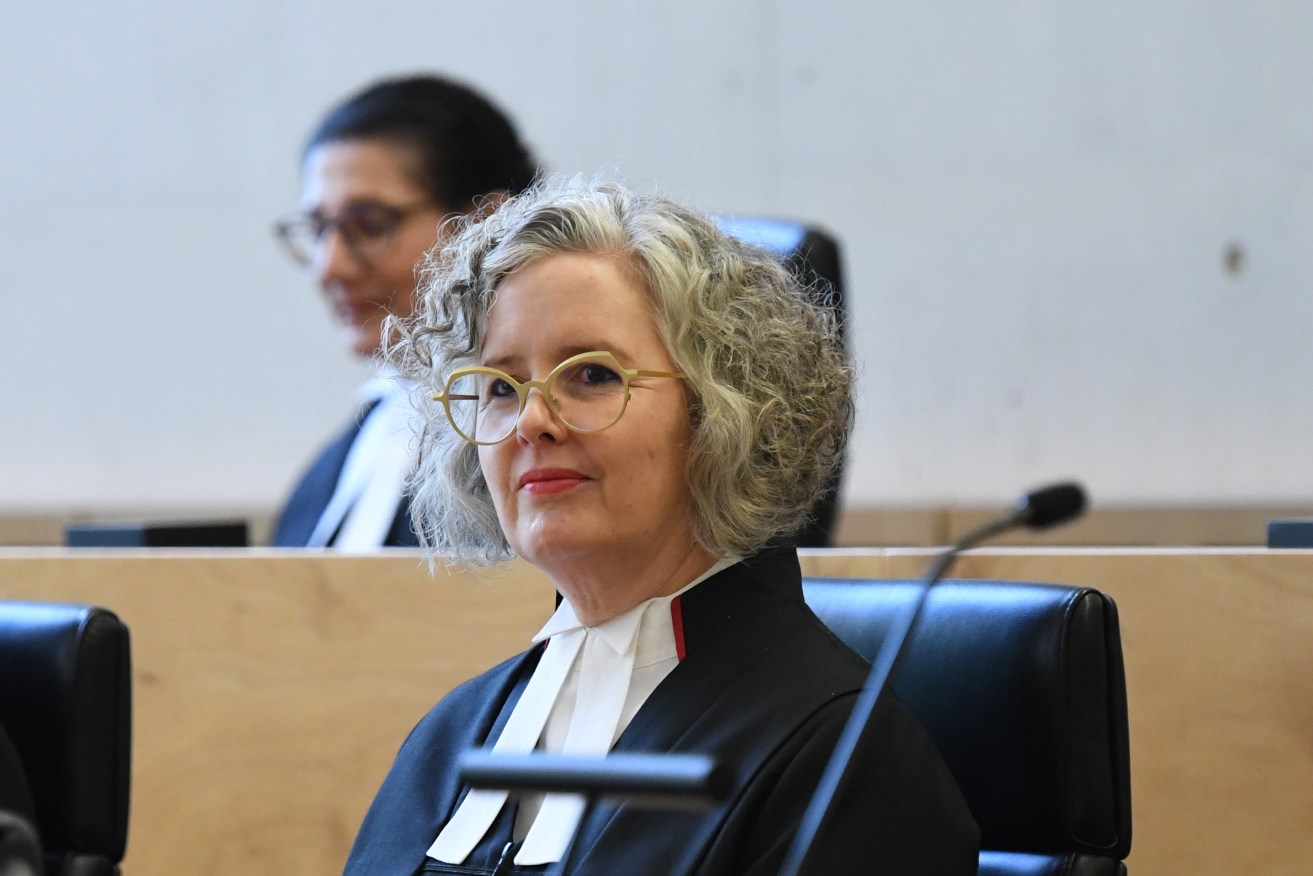 Queensland Chief Justice Helen Bowskill is seen during the swearing in ceremony for Supreme Court judge Lincoln Crowley (left) at the Queen Elizabeth II Courts of Law in Brisbane, Monday, June 13, 2022. Australia's first Indigenous Supreme Court judge Lincoln Crowley has been sworn in at a public ceremony in Brisbane. (AAP Image/Darren England) NO ARCHIVING