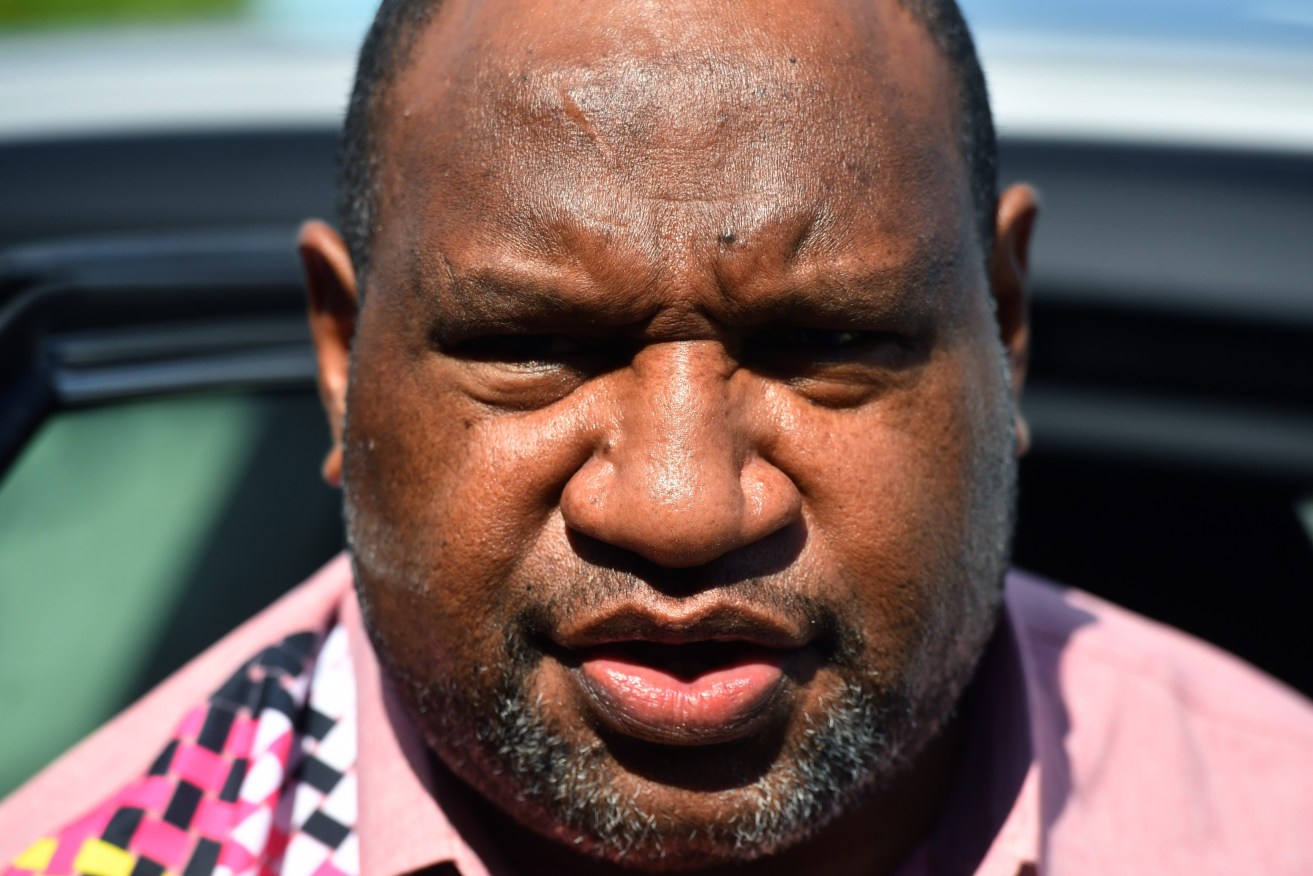 Papua New Guinea's Prime Minister James Marape says his government has been "at work" trying to free the Australian hosstages. (AAP Image/Mick Tsikas) 