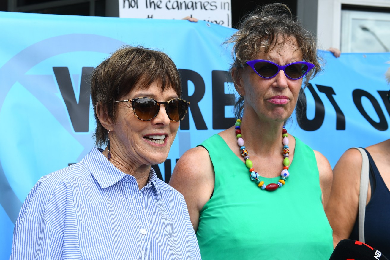 Lee Ann Coaldrake (left) said Australian governments were trying to silence climate protesters (AAP Image/Jono Searle) 