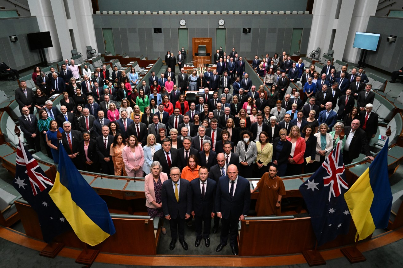 Parliamentary members and senators with Ukraine’s ambassador to Australia Vasyl Myroshnychenko pose for a photograph in the House of Representatives. (AAP Image/Mick Tsikas) 