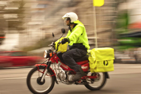 Red-letter day: Australia Post to kill off posties’ petrol-powered bikes