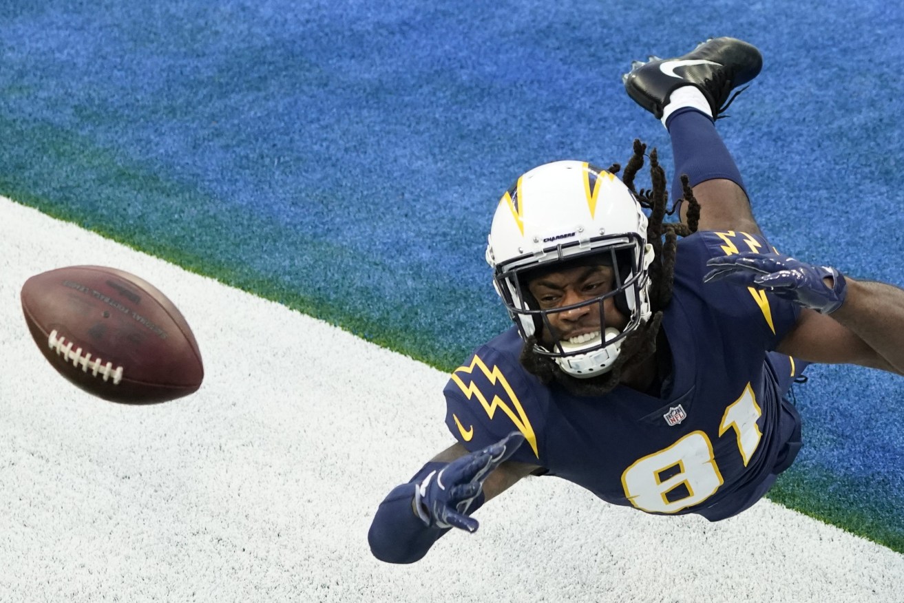 Los Angeles Chargers wide receiver Mike Williams unsuccessfully tries to make a catch in the end zone during the second half of an NFL football game against the Las Vegas Raiders, Sunday, Nov. 8, 2020, in Inglewood, Calif. (AP Photo/Ashley Landis)