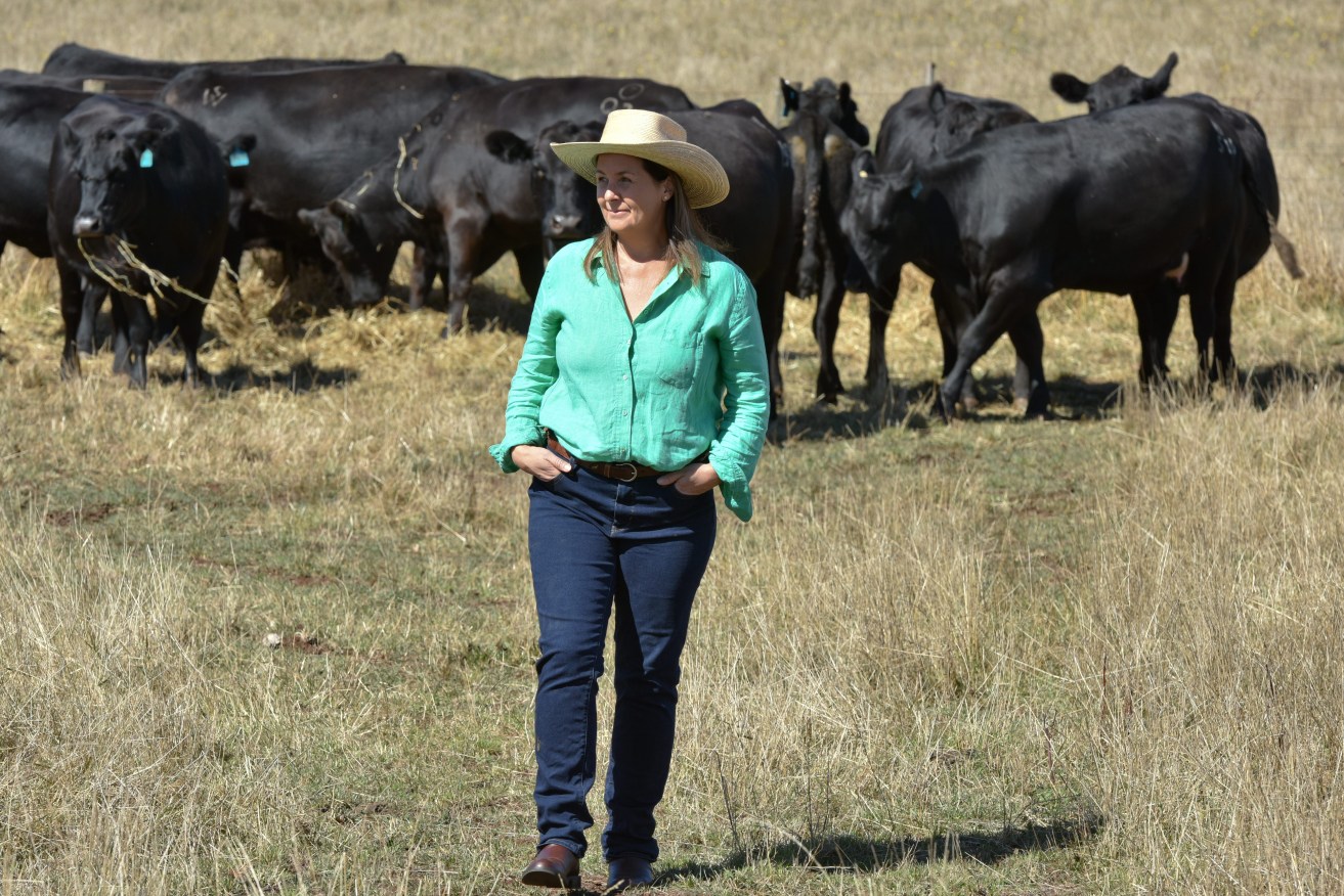Farmer Olivia Lawsonon her property in Clarkes Hill north east of Ballarat, Victoria, Victoria.  Most Ausralian farmers want to be greener but need help to get there, a report has found (AAP Image/Jeremy Bannister) 