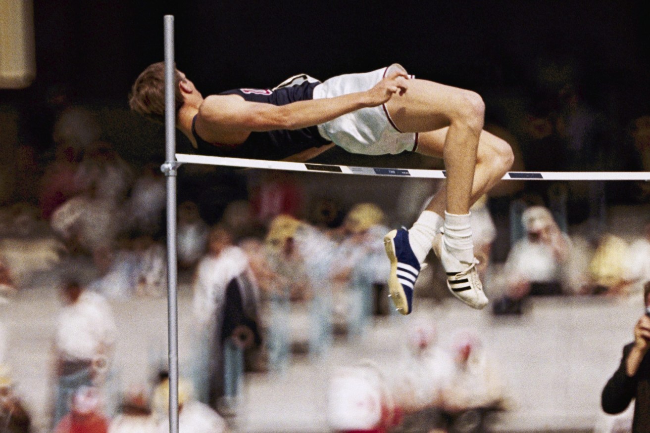 Dick Fosbury, the lanky leaper who completely revamped the technical discipline of high jump and won an Olympic gold medal with his “Fosbury Flop,” has died at 76. (AP Photo/AP)