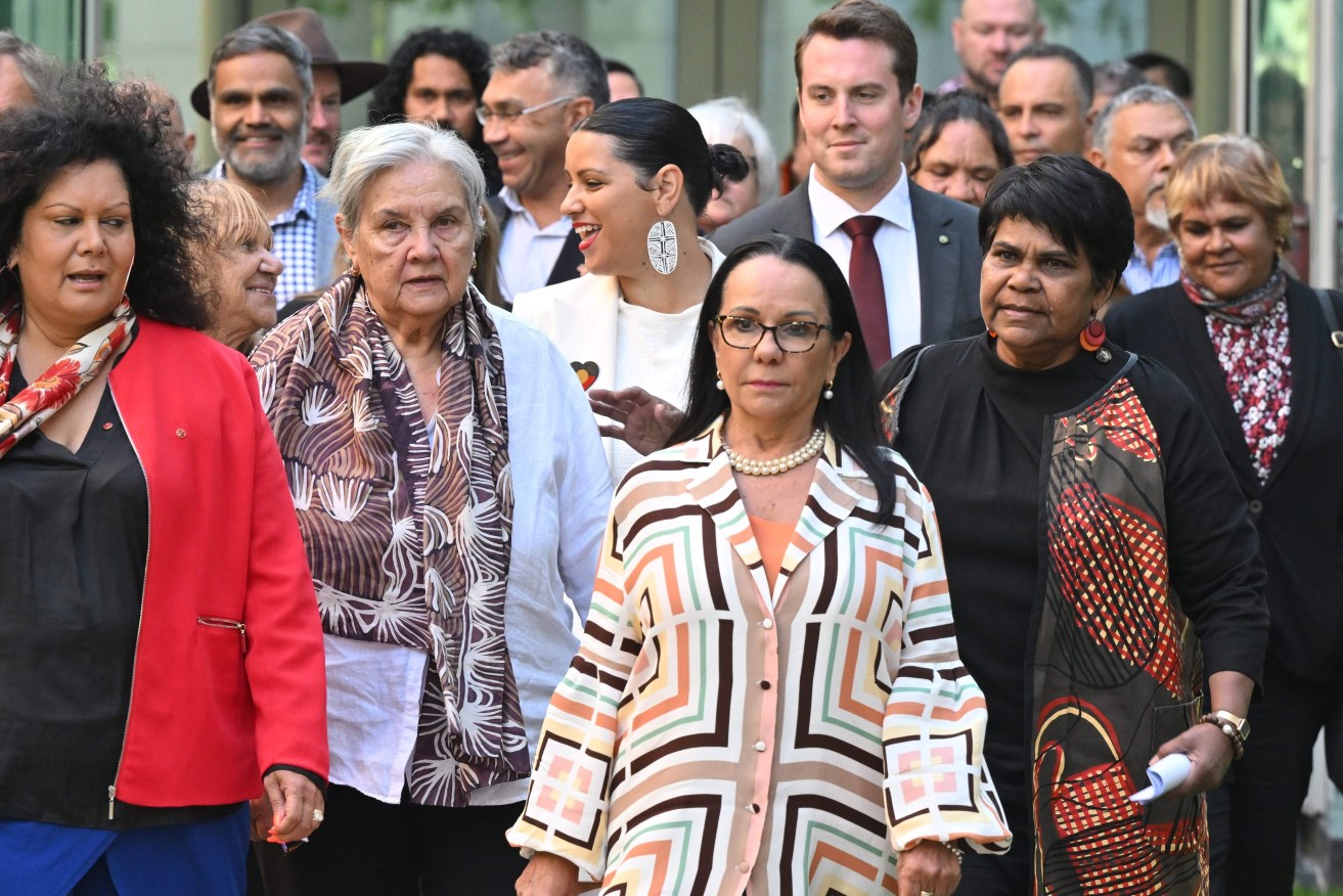 Labor senator Malarndirri McCarthy, Lowitja Foundation Chair Pat Anderson and Minister for Indigenous Australians Linda Burney lead the Voice working group to a press conference. (AAP Image/Mick Tsikas) 