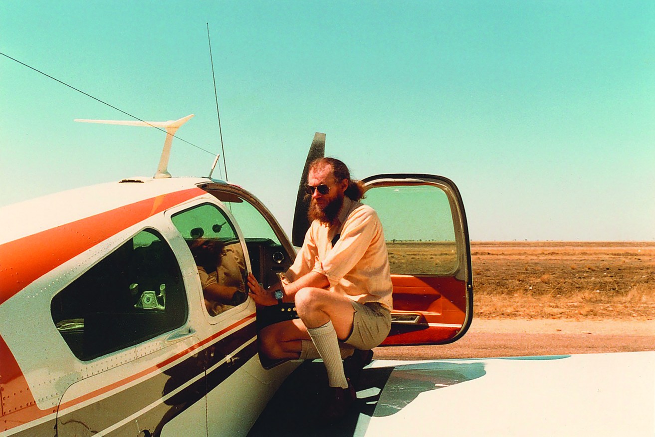 Mervyn Moriarty with the Cessna he flew throughout regional Queensland from 1971. (Photo: Supplied).