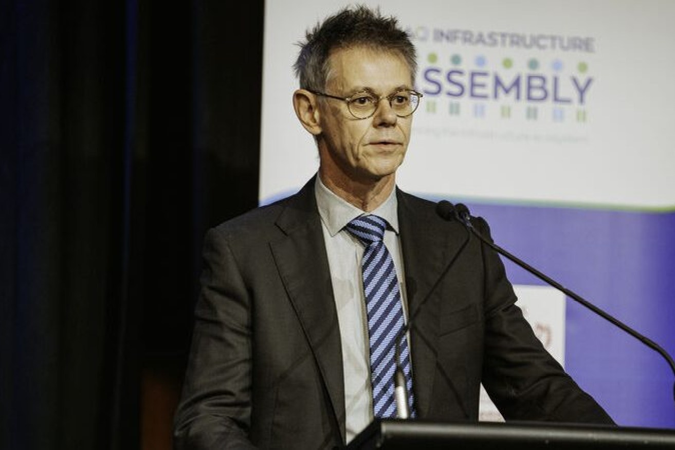 State Development director-general Mike Kaiser speaking at a recent Infrastructure Association of Queensland event. (Image: IAQ)