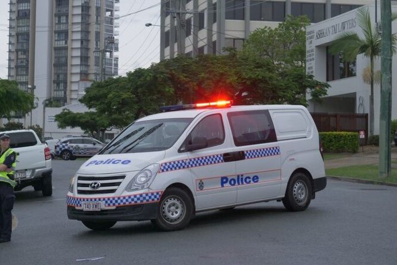 Police have launched a manhunt for a driver who fired a gun at another driver after a road range incident on the Gold Coast. (Image; ABC Dominic Consdale)