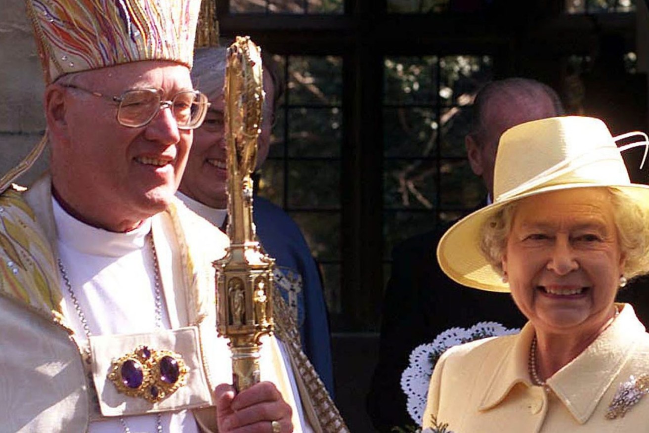 Britain's Queen Elizabeth II and the Archbishop of Canterbury, Doctor George Carey, stand outside the Deanery at Canterbury Cathedral after attending a Royal Maunday service, Thursday  March 28, 2002.  (AP Photo/ Fiona Hanson/POOL)