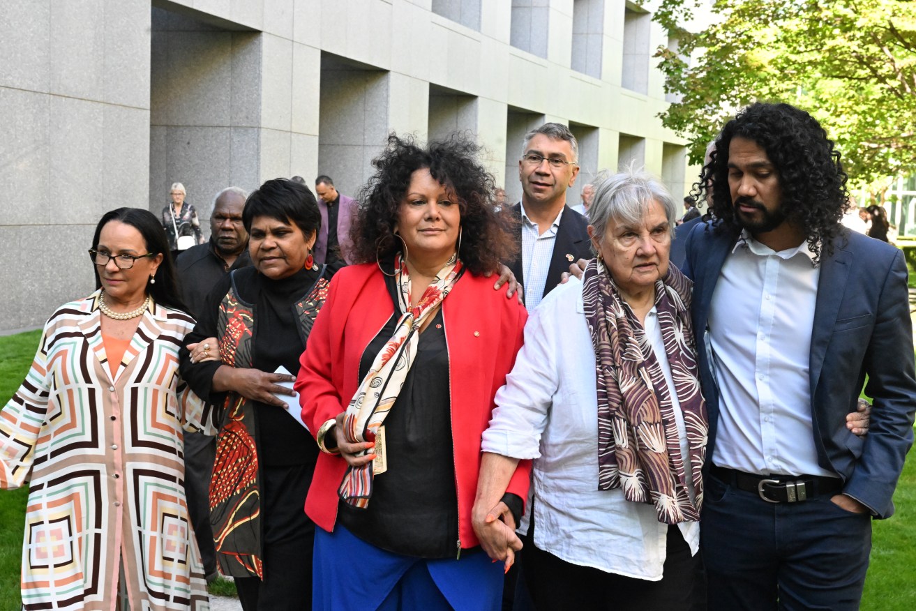 Minister for Indigenous Australians Linda Burney, Labor member for Lingiari Marion Scrymgour, Labor senator Malarndirri McCarthy, Lowitja Foundation Chair Pat Anderson and Nathan Appo leave after a press conference after the bill to establish an Aboriginal and Torres Strat Islander Voice was introduced in the House of Representatives at Parliament House in Canberra, Thursday, March 30, 2023. (AAP Image/Mick Tsikas) 