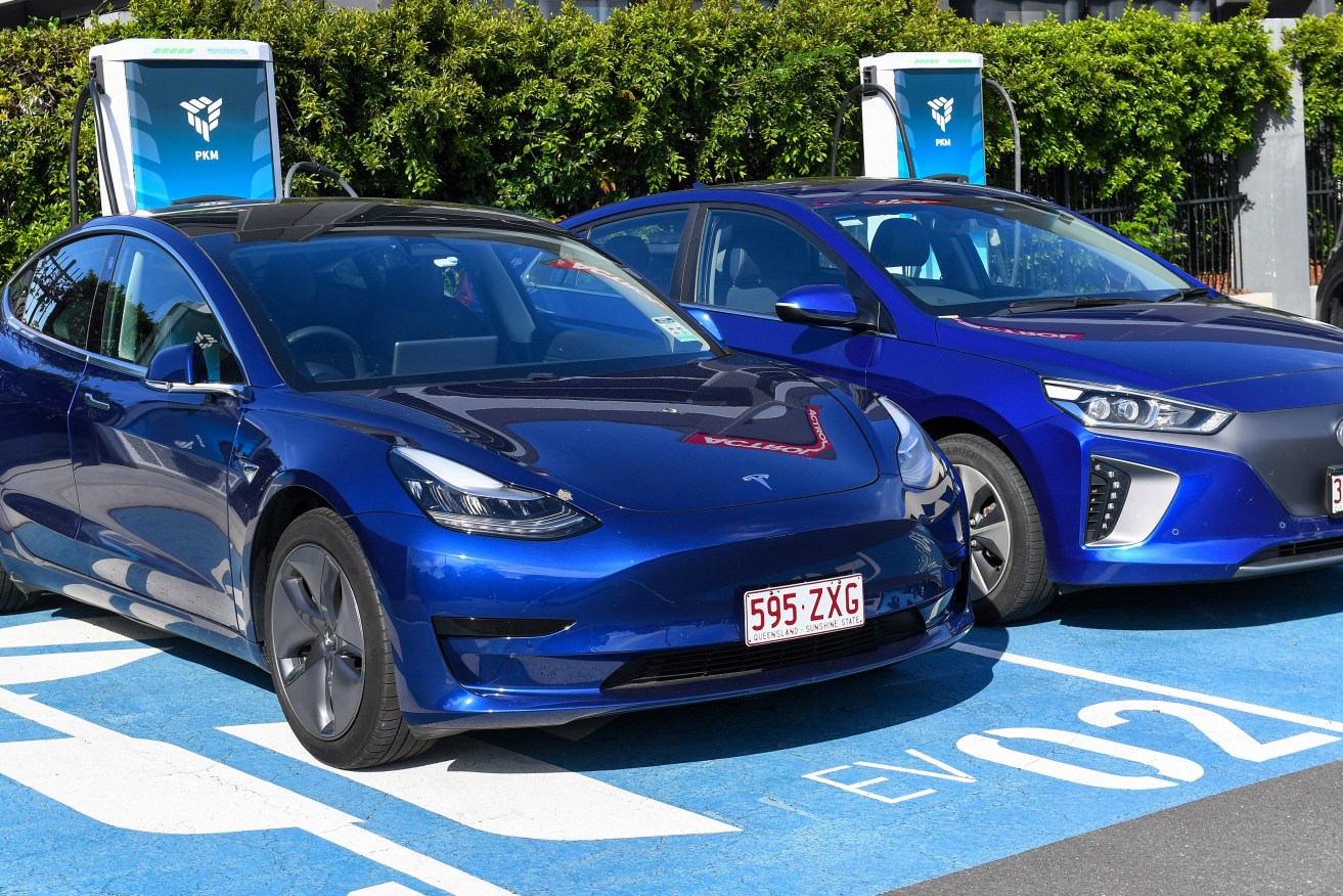  Mayors from around Australia are pushing the Federal Government to fast-track laws to encourage more electric vehicles on our roads . (AAP Image/Jono Searle)