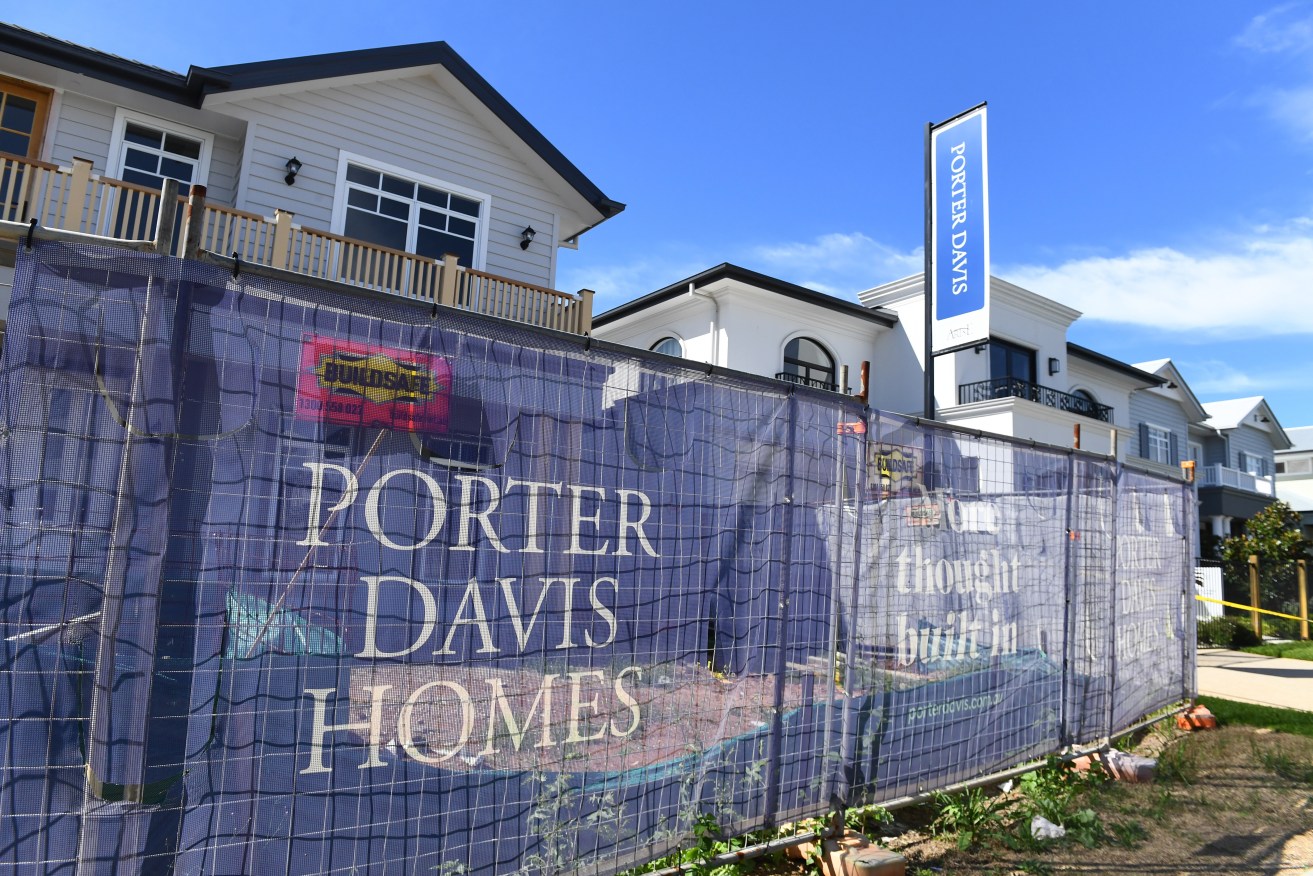 A partially finished Porter Davis home in Rochedale,. Building works stopped immediately on more than 1700 properties in Victoria and Queensland. (AAP Image/Jono Searle) 