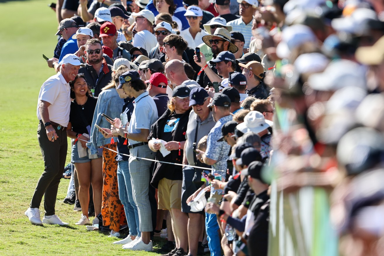 LIV Golf CEO and Commissioner Greg Norman with fans during LIV Golf Adelaide at the Grange Golf Club in Adelaide, Friday, April 21, 2023. (AAP Image/Matt Turner) 