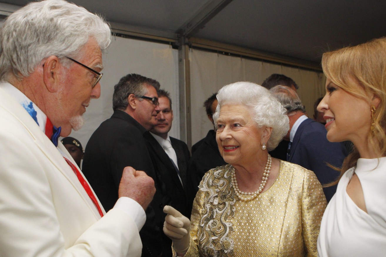  Rolf Harris (left) with Queen Elizabeth II and Kylie Minogue backstage at The Diamond Jubilee Concert outside Buckingham Palace (Dave Thompson/PA Wire)