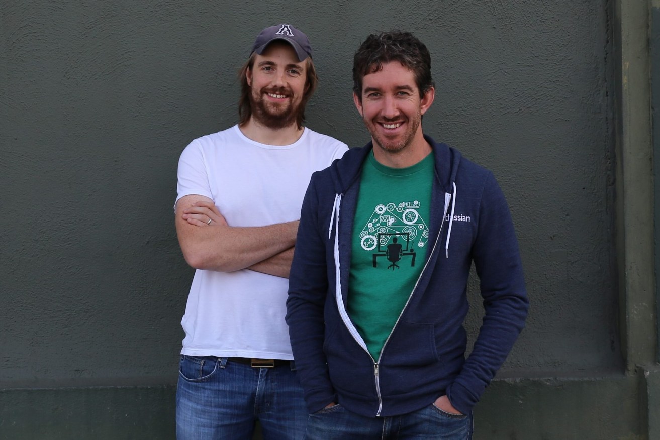  Co-Founders of Sydney technology company Atlassian Scott Farquhar and Mike Cannon-Brookes.  (AAP Image/Howorth) 