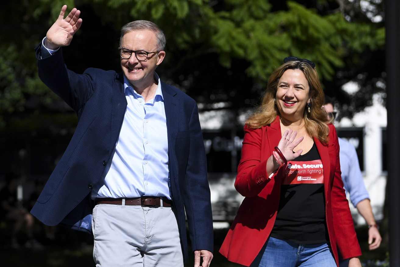 Australian Opposition Leader Anthony Albanese and Queensland Premier Annastacia Palaszczuk arrive ahead of joining the Labour Day march. (AAP Image/Lukas Coch) 
