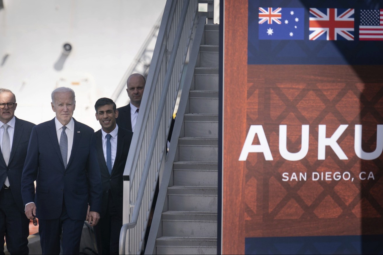 Britain's Prime Minister Rishi Sunak, right, during a meeting with U.S. President Joe Biden, center, and Prime Minister of Australia Anthony Albanese, left, at Point Loma naval base in San Diego as part of Aukus, a trilateral security pact between Australia, the UK, and the U.S. (Stefan Rousseau/Pool Photo via AP)