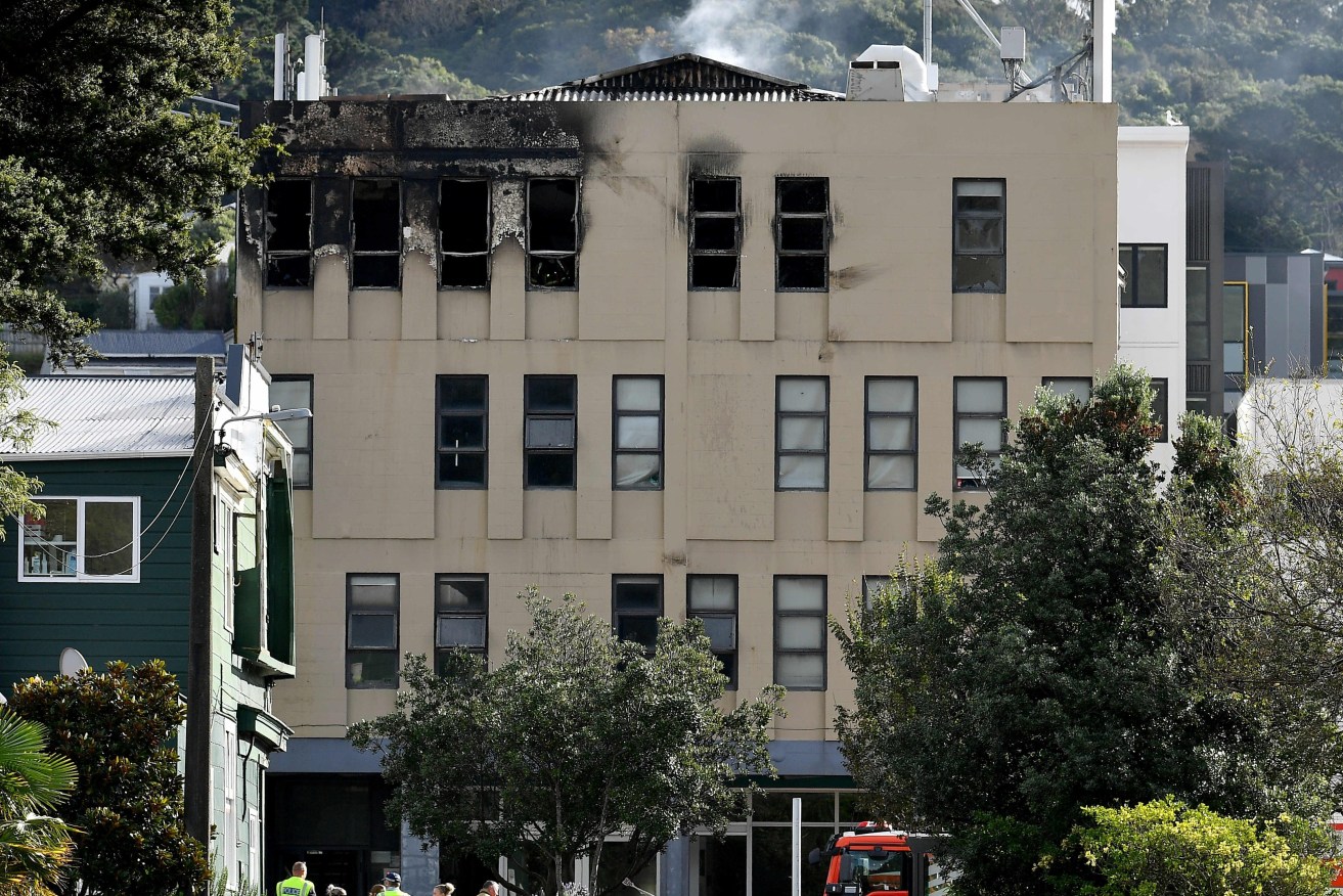 An exterior view of the Loafers Lodge after a fatal hostel fire in Wellington, NZ, Tuesday, May 16, 2023. Multiple people are believed to be dead after a "worst nightmare" fire at a 92-room hostel in New Zealand. (AAP Image/Masanori Udagawa) 
