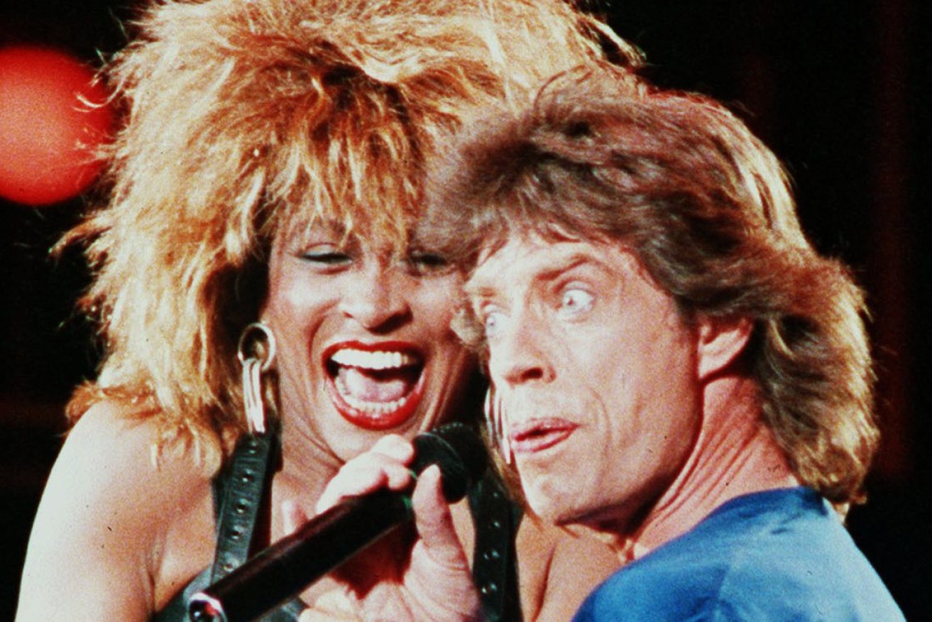 Tina Turner and Mick Jagger perform at the Live Aid concert Saturday night in Philadelphia on July 13, 1995.  Turner has died at 83. (AP-Photo/Amy Sancetta, File)