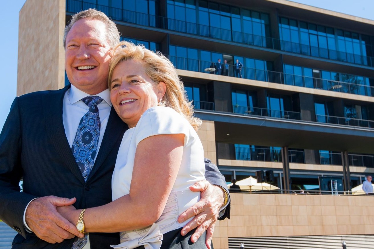  Andrew 'Twiggy' Forrest, pictured with his now-estranged wife Nicola Forrest has been exonerated claims that he had an improper relationship with a Fortescue Metals employee. (AAP Image/Supplied by University of WA) 