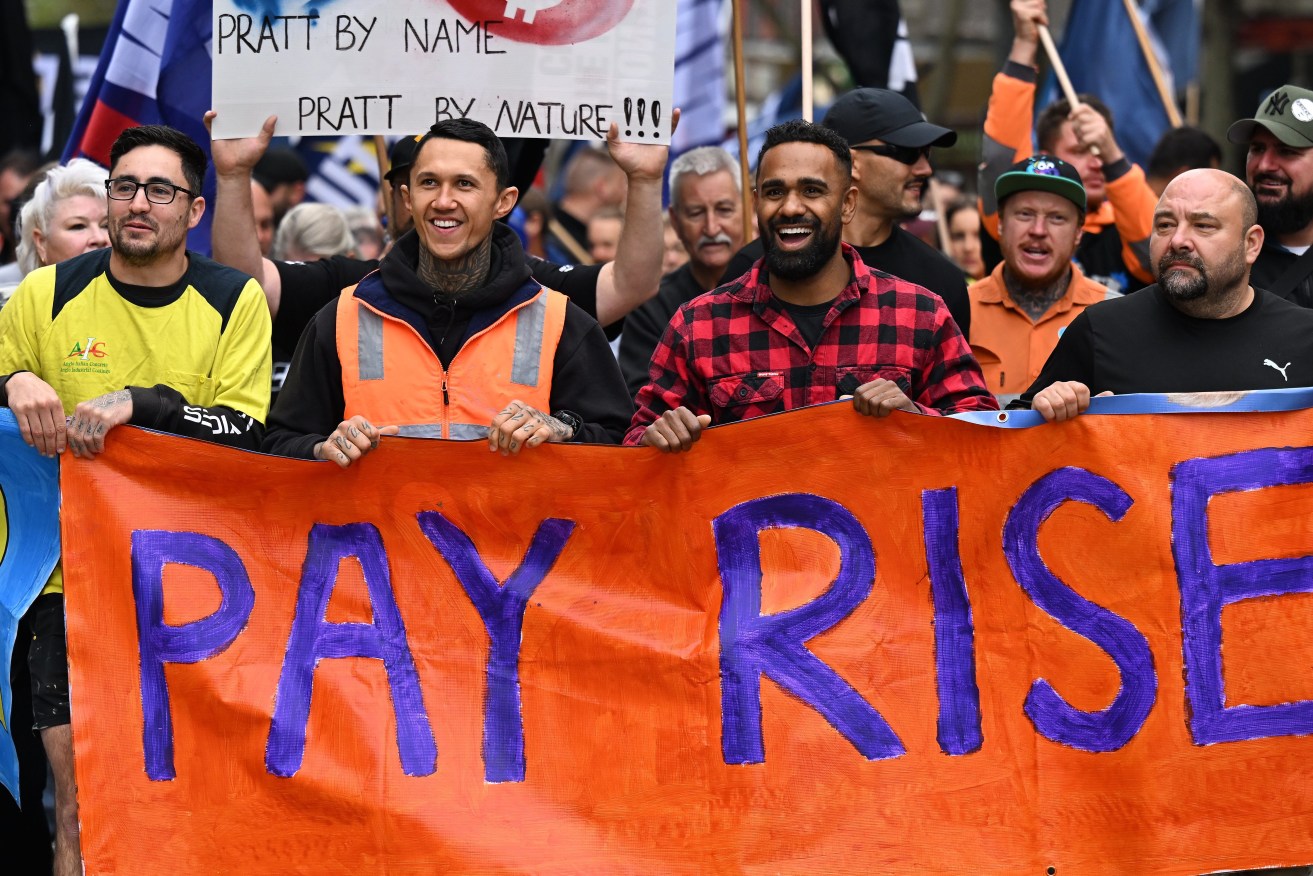 The decision means that the minimum wage would increase by about $46 a week bringing the total to about $860 a week. (AAP Image/James Ross) 