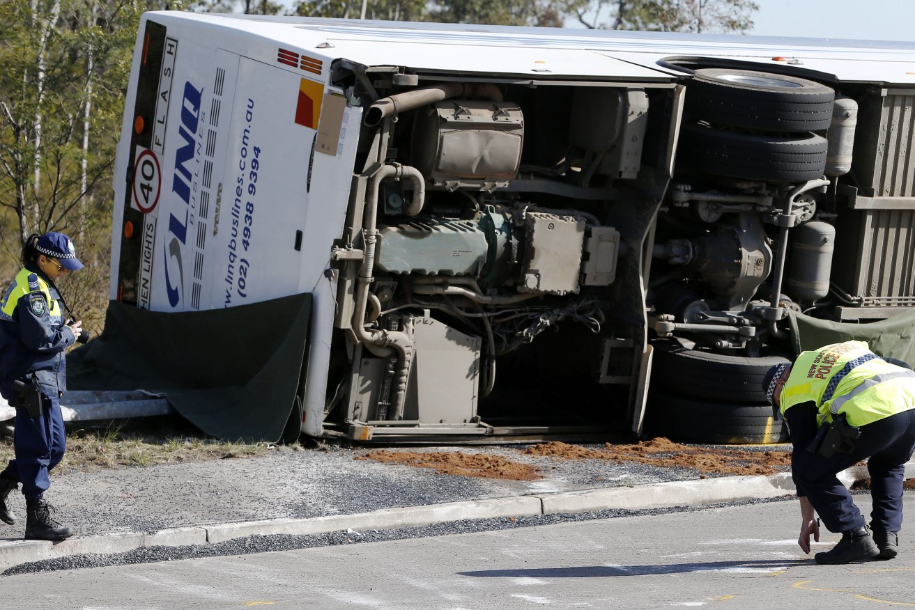  As many as 10 people have been killed in a bus crash in the NSW Hunter Valley, police say.  (AAP Image/Darren Pateman) 
