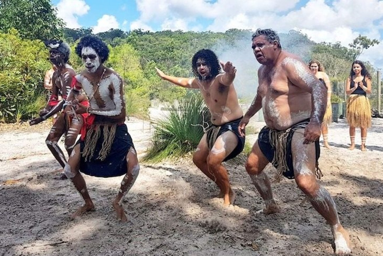 Traditional owners on K'Gari. (Image: ABC News)