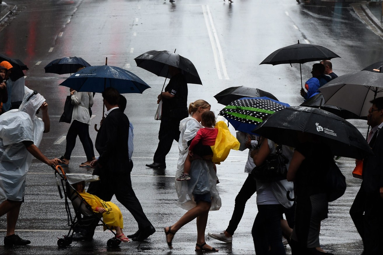 Some cooler, rainy weather during the school holidays have raised fears of a flu outbreak.  (AAP Image/Dean Lewins) 