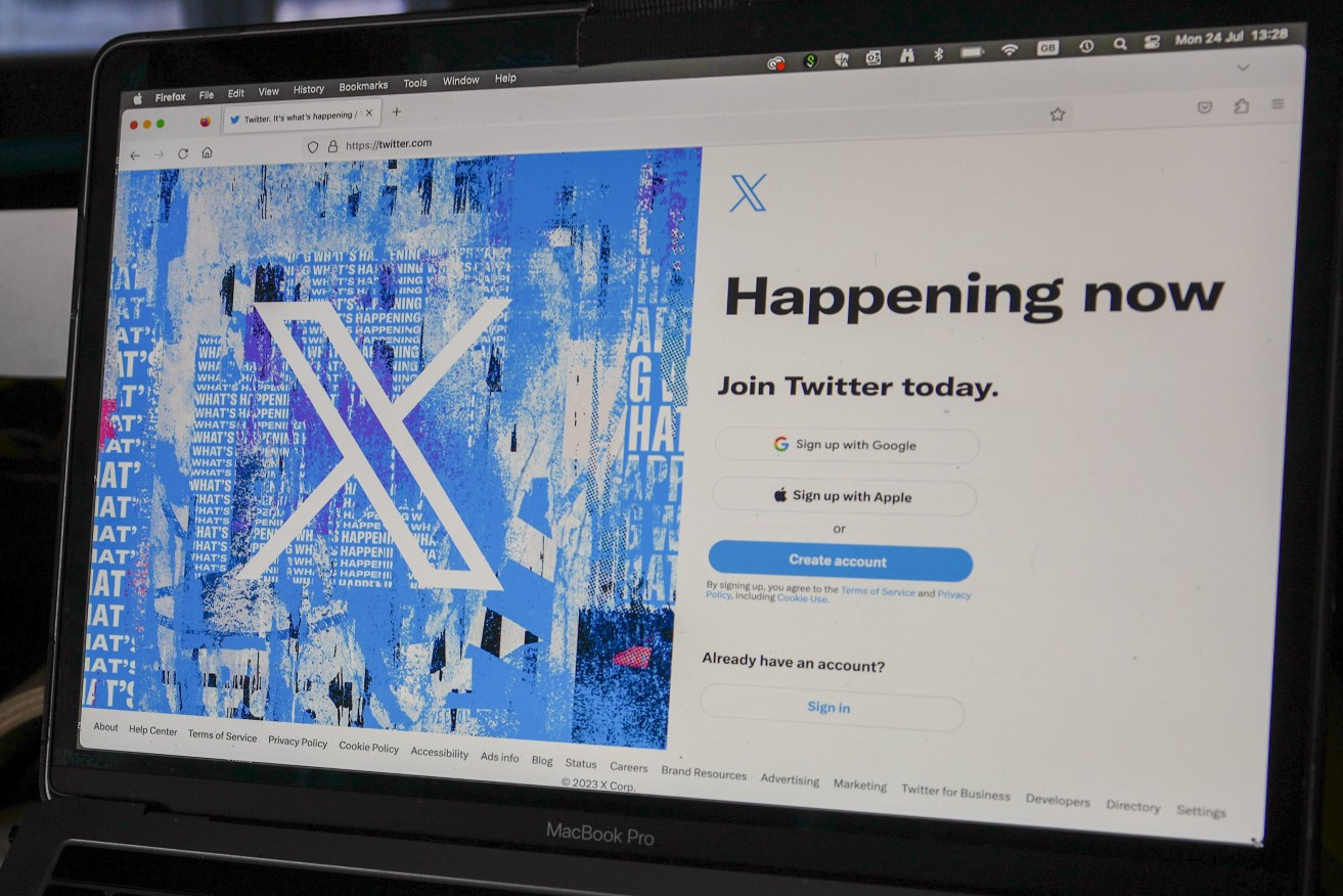 A view of a lap top showing the Twitter signing in page displaying the new logo. Elon Musk has unveiled a new black and white "X" logo to replace Twitter's famous blue bird as he follows through with a major rebranding of the social media platform he bought for $44 billion last year.(AP Photo/Darko Vojinovic)