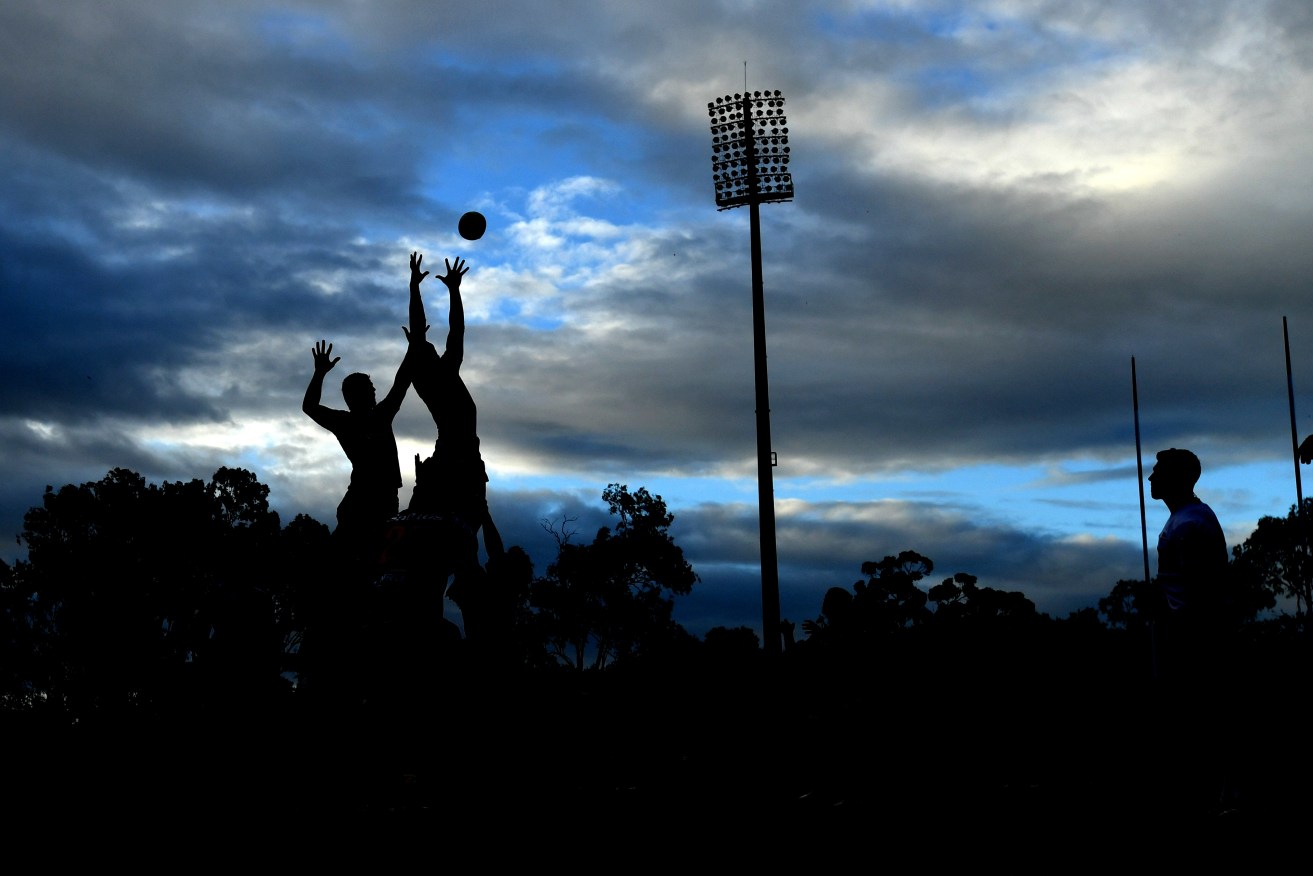 Players are seen during the line-out during a Super Rugby trial match between the Queensland Reds and the Western Force at Ballymore Stadium in Brisbane, Saturday, February 5, 2022.  (AAP Image/Darren England) NO ARCHIVING, EDITORIAL USE ONLY